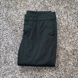 Cropped green trousers